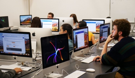 Students using iMacs.