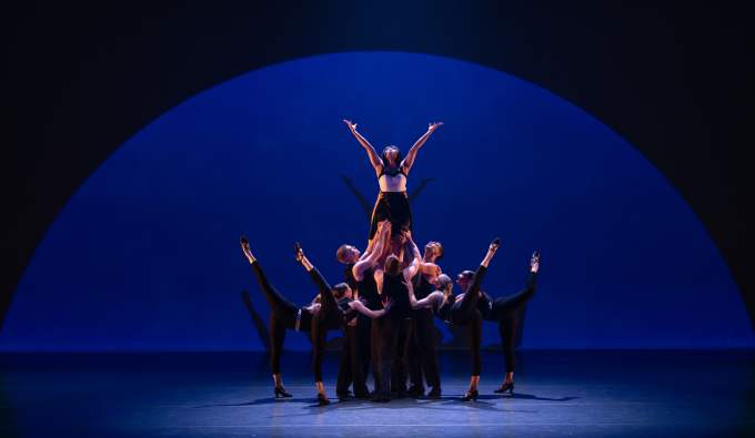 members of giordano dance performing on stage. 