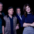 members of 10,000 maniacs posing. 