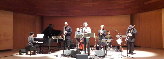 members of mingus dynasty septet performing on stage. 